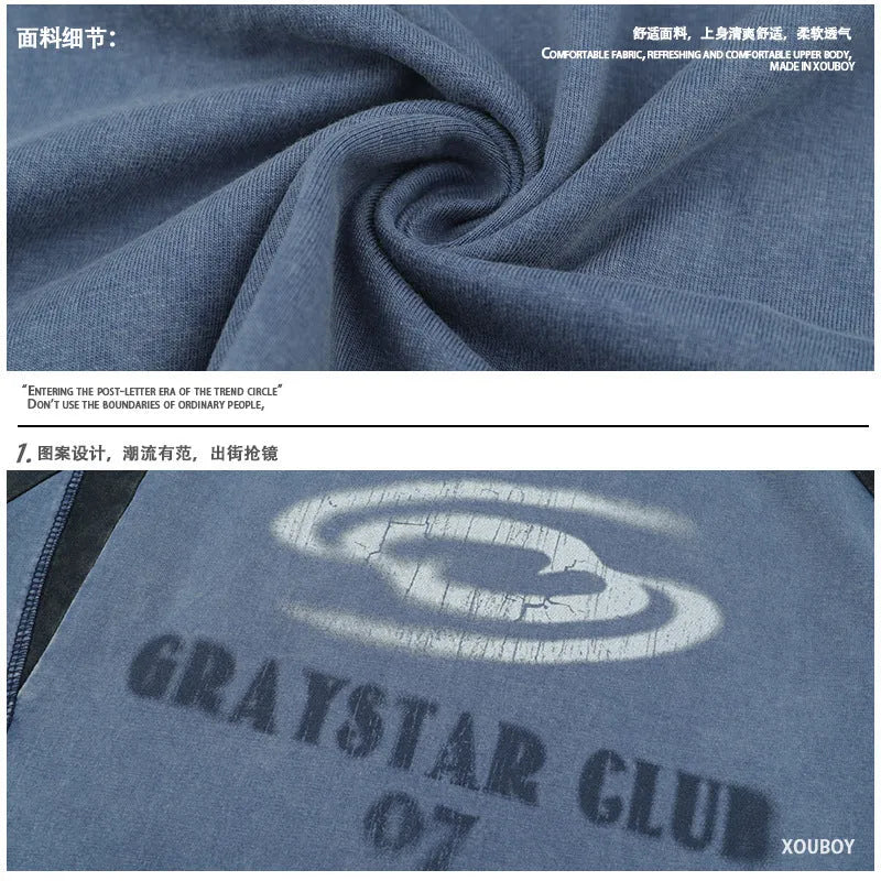 Men's blue raglan sleeve t-shirt with large white letter print in loose fit style
