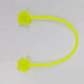 Purple silicone star-shaped cable winder with magnet, holding a coiled white USB cable.