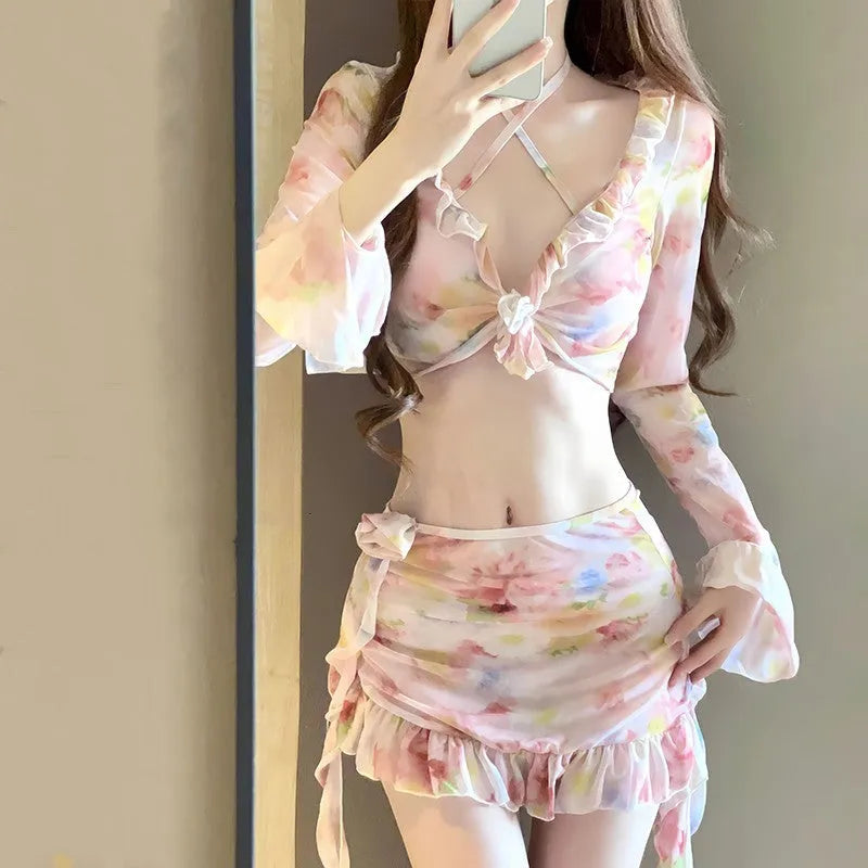 Women's floral bikini swimsuit set in cherry blossom pink colour.