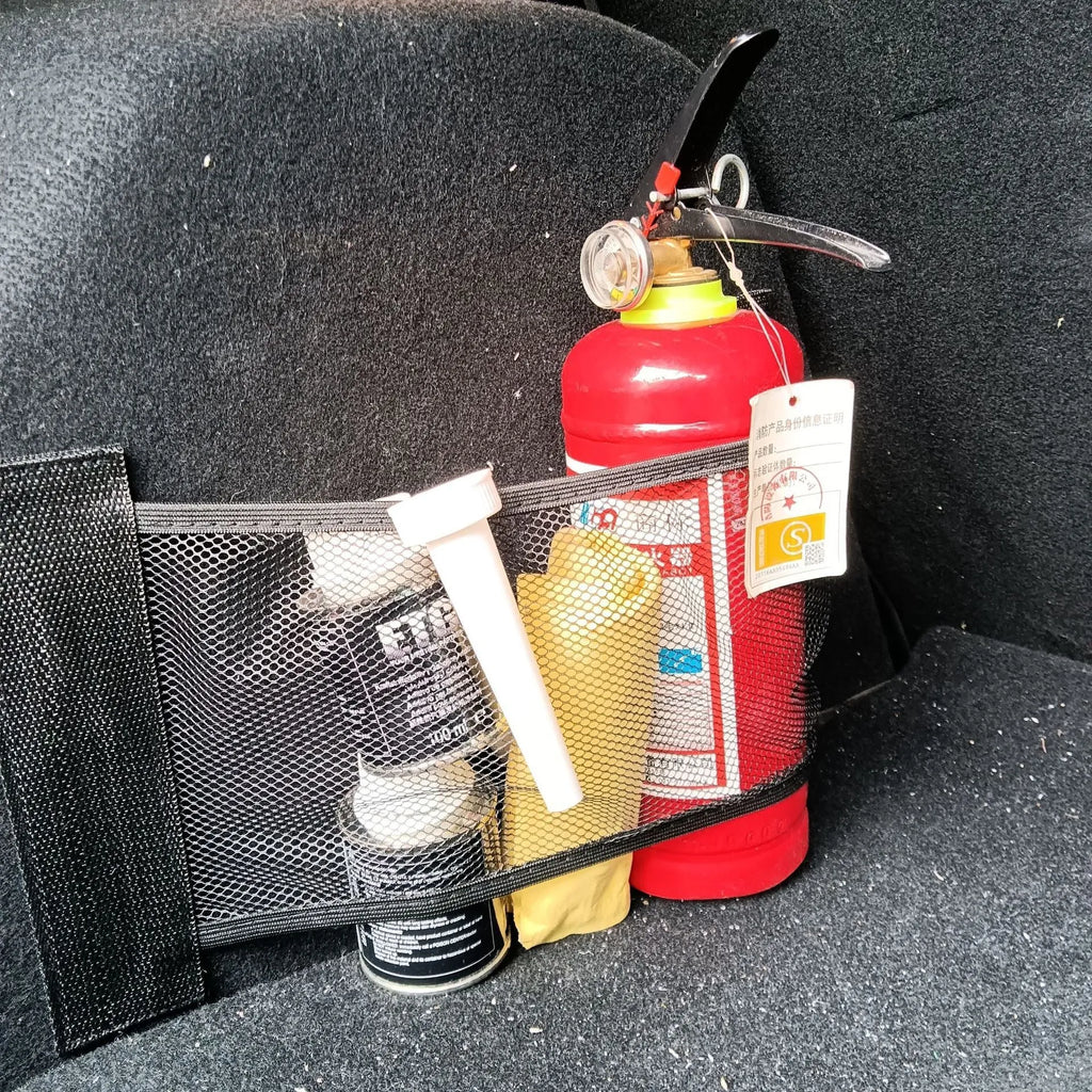 Elastic polyester car boot storage net shown in 20x45cm size securing loose items.