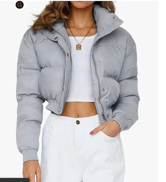 Women's loose fit polyester leisure jacket in blue, grey, black or milky white with long sleeves