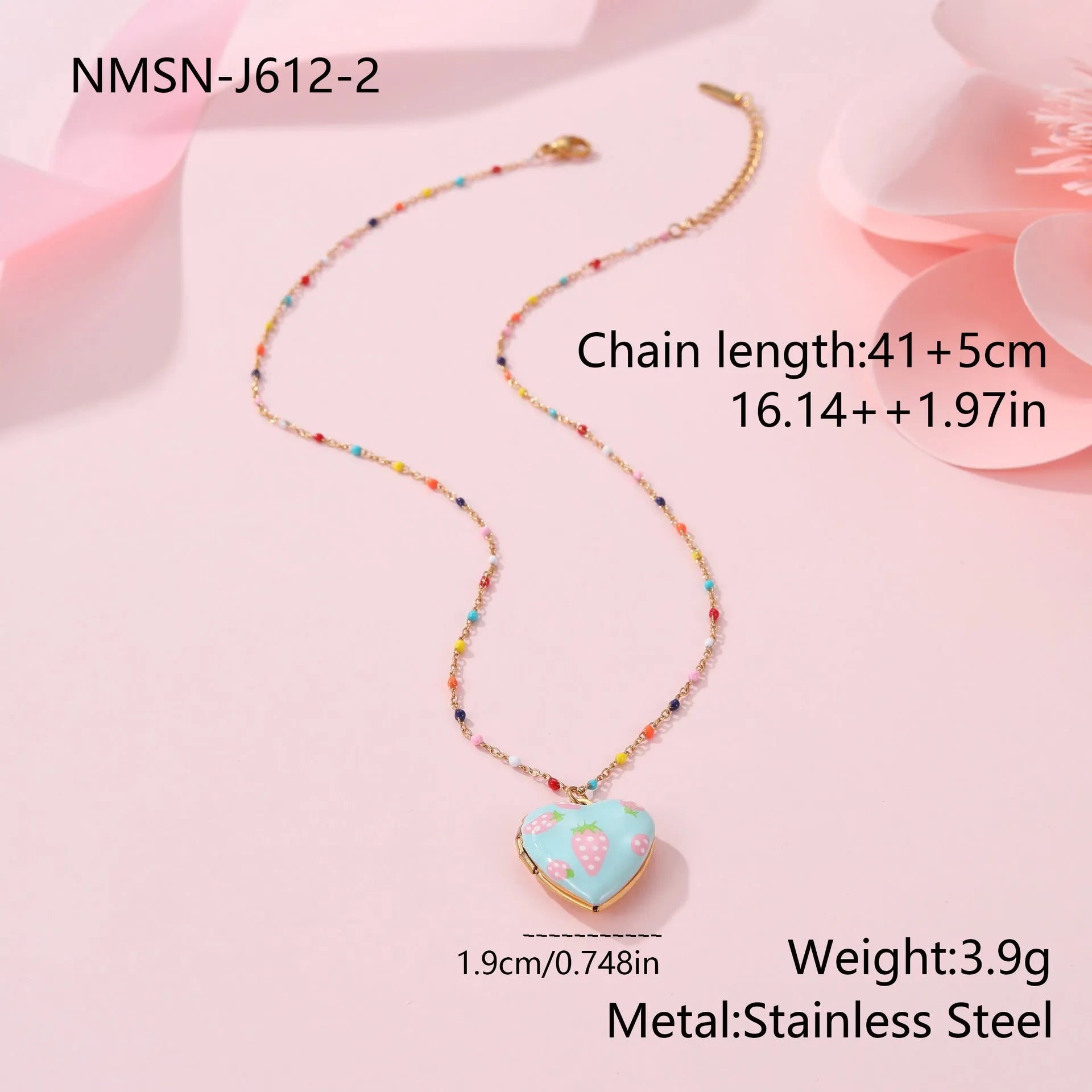 Women's stainless steel necklace with 18K gold plating showing heart pendant with fruit designs