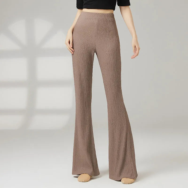 Women's solid colour classical dance practice pants in polyester fabric shown in beige apricot.