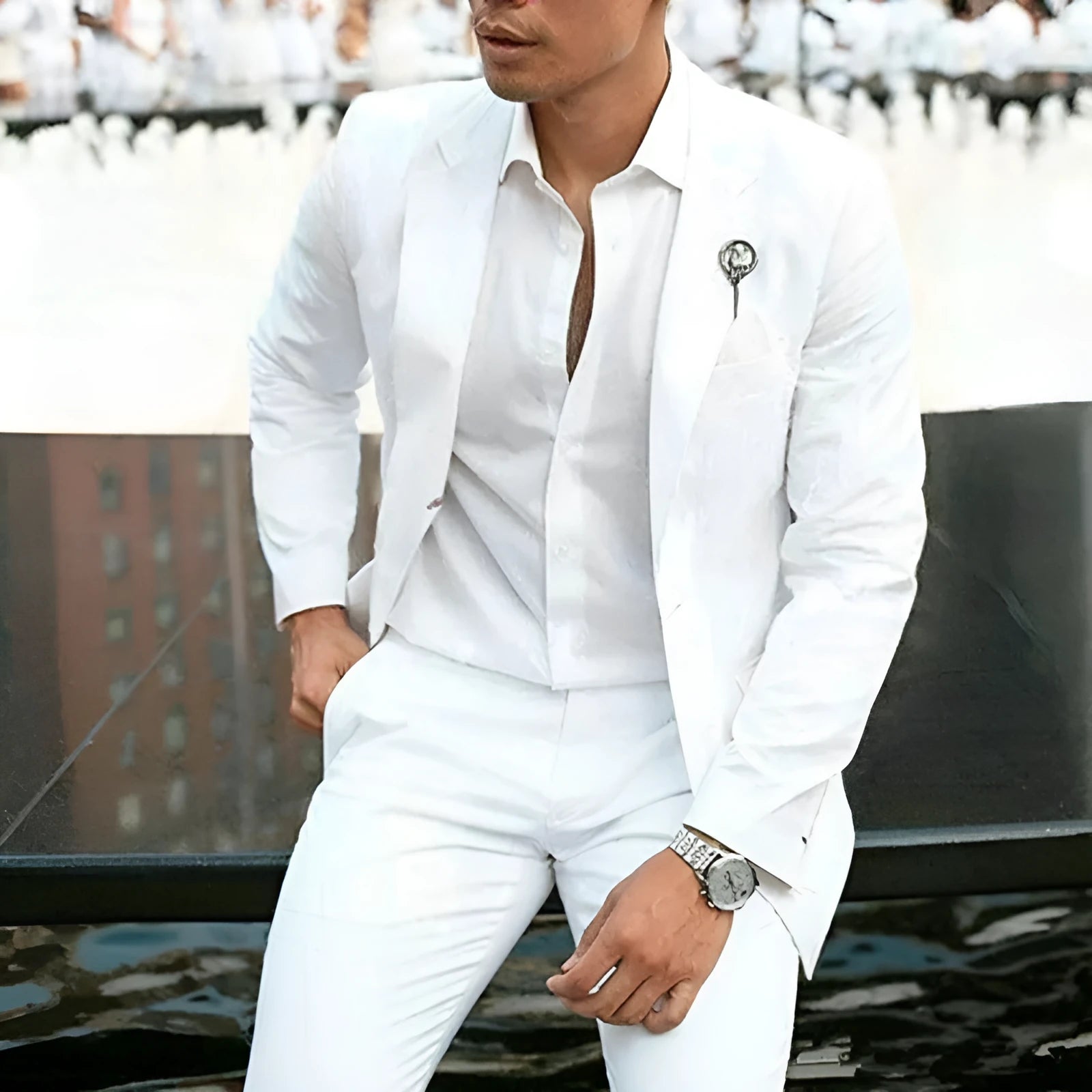 White men's two-piece slim fit wedding suit with jacket and trousers on hanger