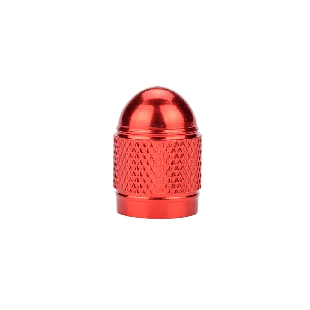 Aluminium alloy mountain bike tyre valve cap in gold, red, silver, blue, and black colours.