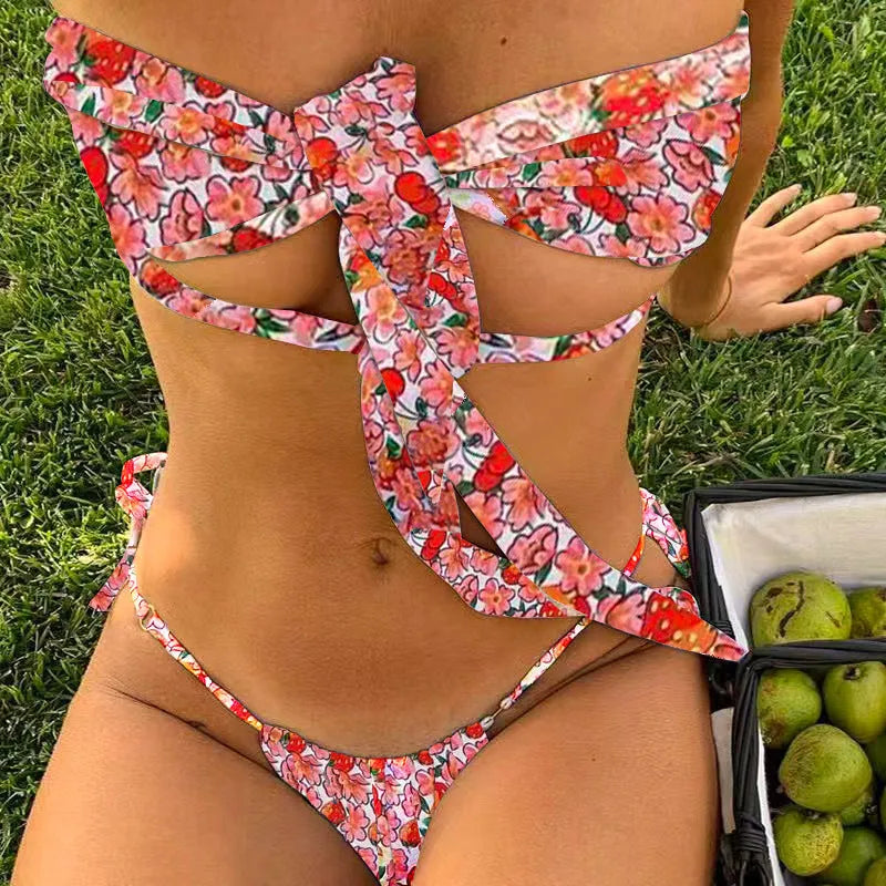 Women's swimsuit with lace-up front and removable chest pads in floral print or solid colour options