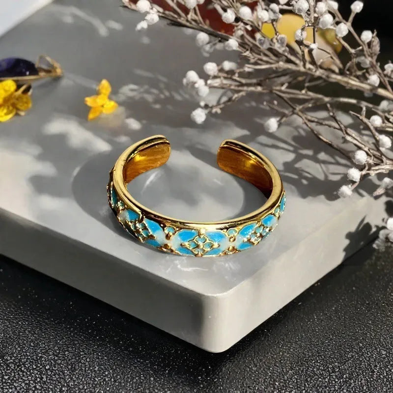 Copper adjustable ring with gourd design, flower and bow shapes, inlaid zircon detailing