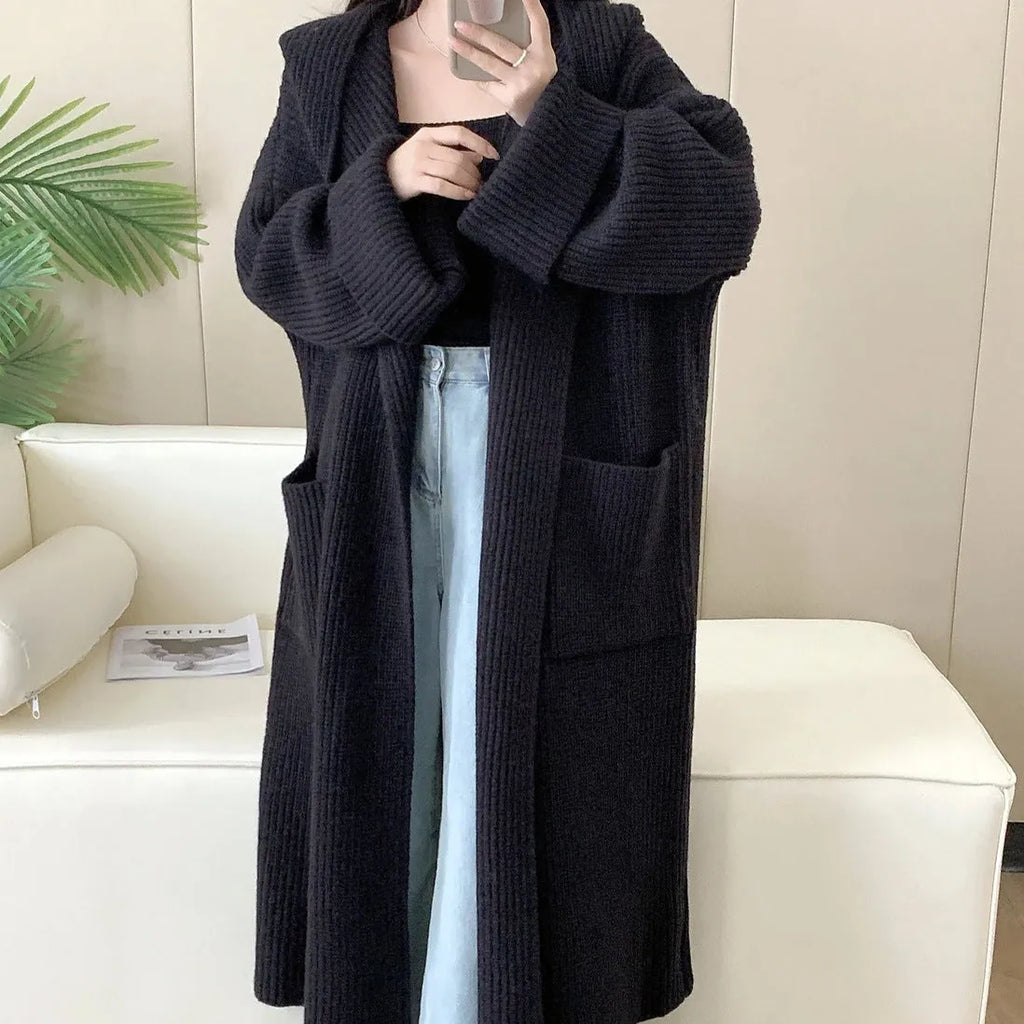 Women's loose hooded cardigan coat in beige with raglan sleeves and extended length