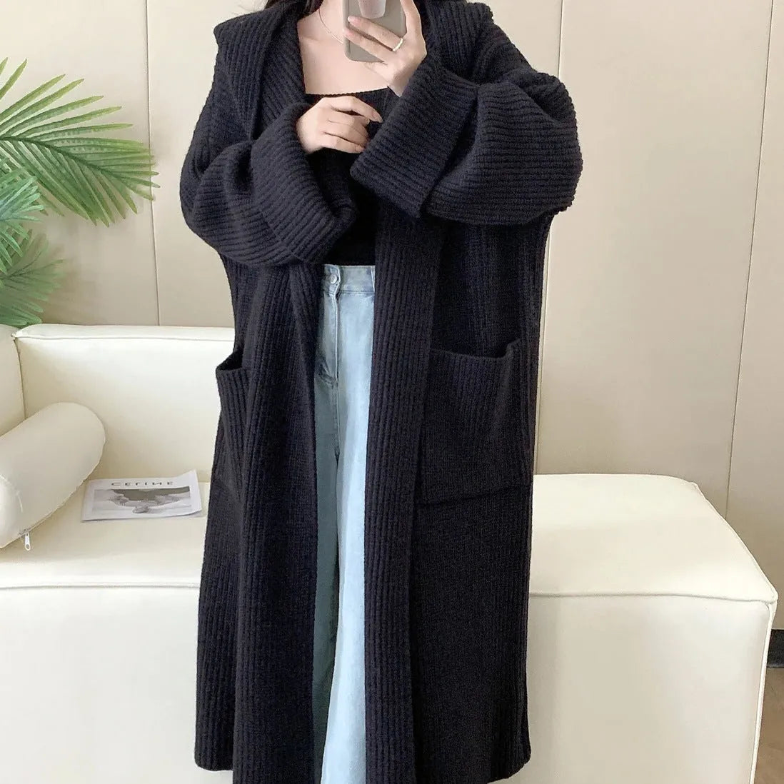 Women's loose hooded cardigan coat in beige with raglan sleeves and extended length
