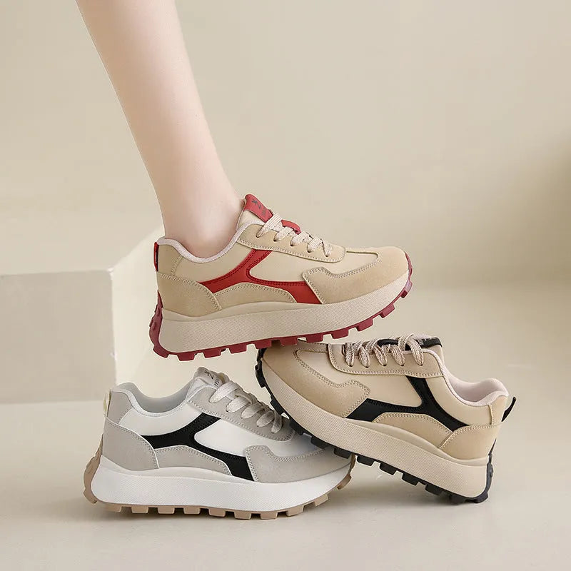 Women's low-top sports running shoes with mesh lining and front lace-up closure in solid colour options