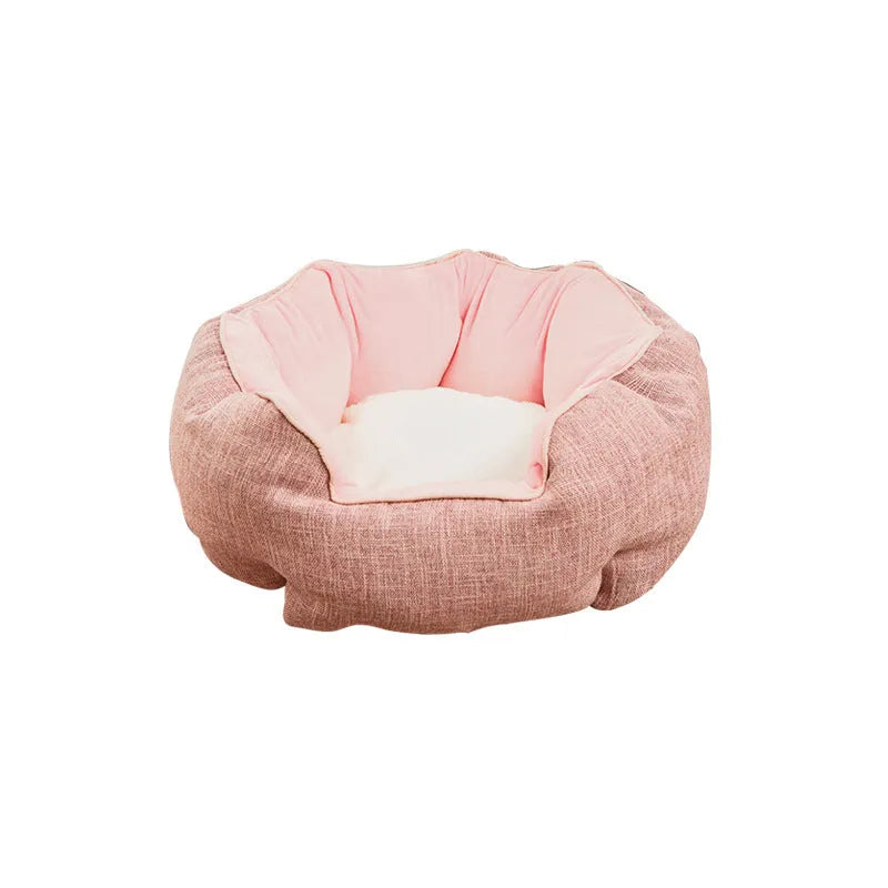 Blue octagonal pet sofa bed with a removable central mat for a small dog or cat.