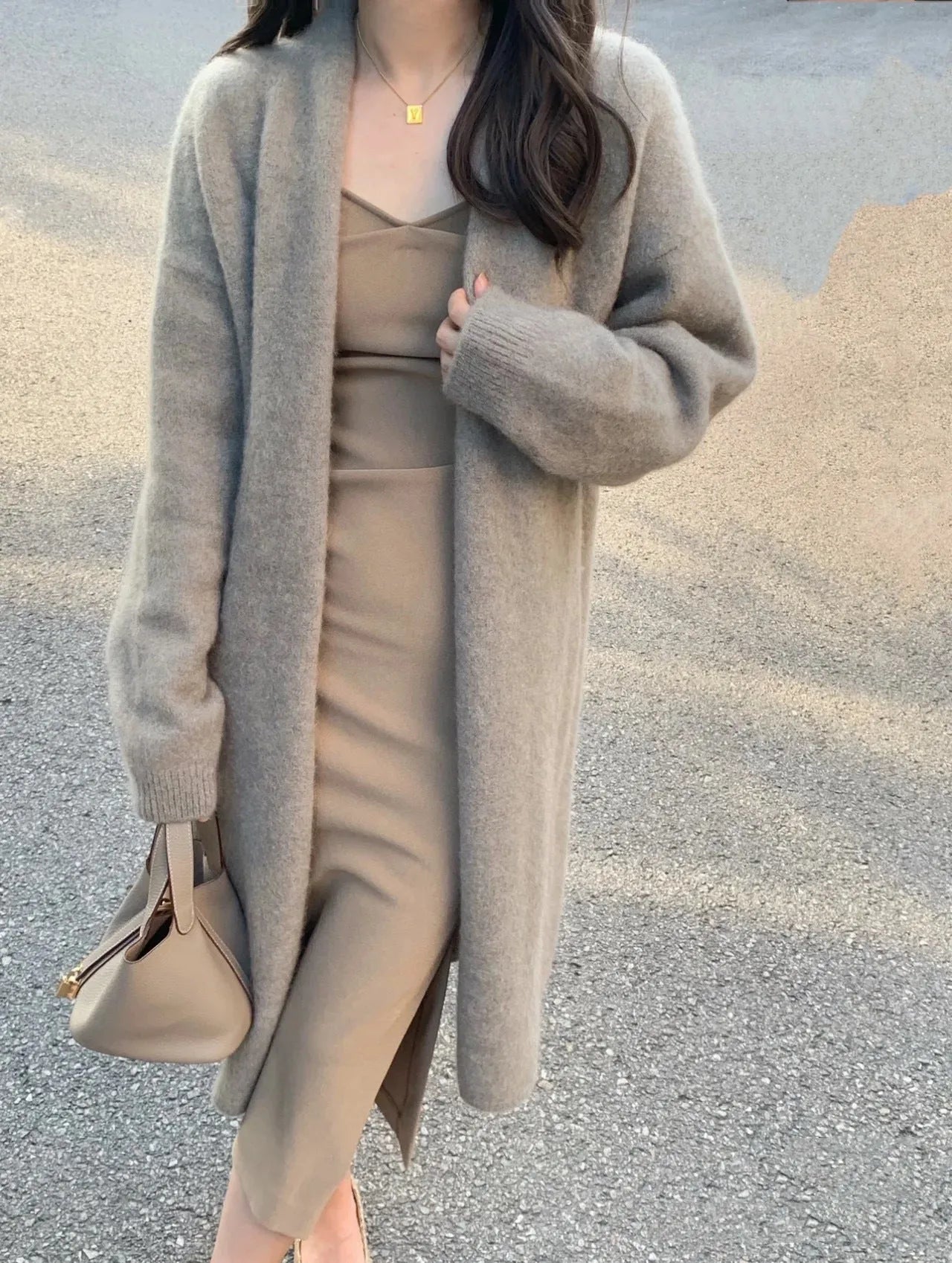 Women's V-neck knitted cardigan in khaki colour with long sleeves and mid-length cut