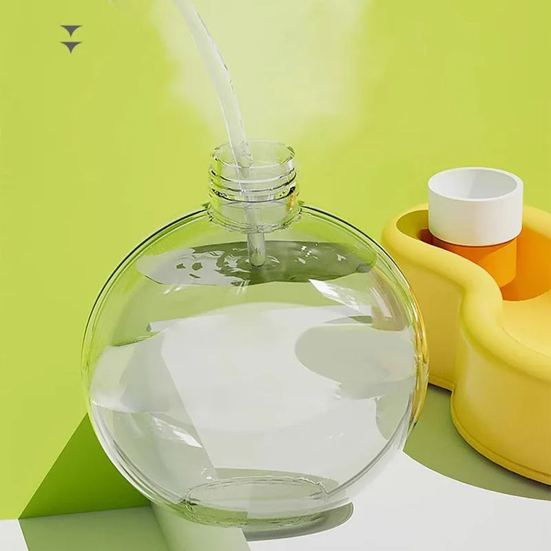 Green portable pet travel water bottle with pull-out drinking bowl for dogs