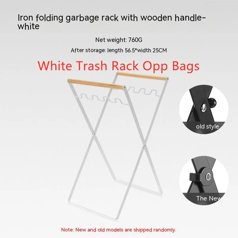 Black folding iron trash rack with wooden handles holding a bin bag outdoors