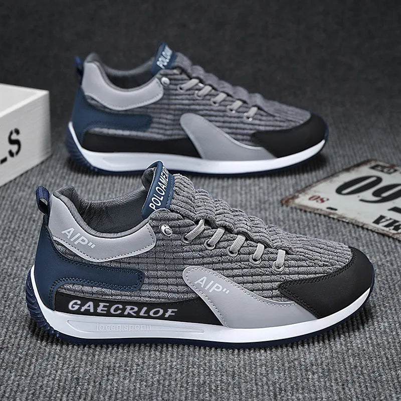 Men's green and grey lightweight mesh running shoes with lace-up front and round toe.