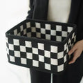 Checkerboard patterned felt storage basket with dimensions 37cm by 29cm by 19.5cm