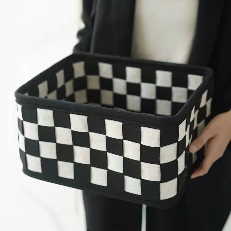 Checkerboard patterned felt storage basket with dimensions 37cm by 29cm by 19.5cm
