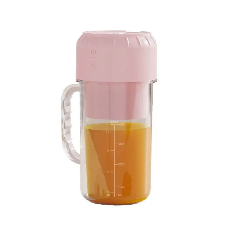 Portable USB juicer in cherry blossom powder or avocado green with multiple blade options