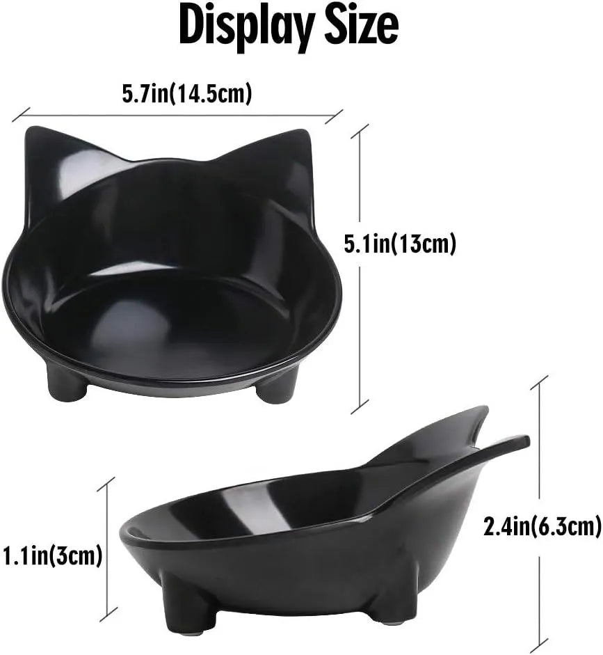 White and black shallow melamine pet bowls with non-slip rubber bases on a floor.