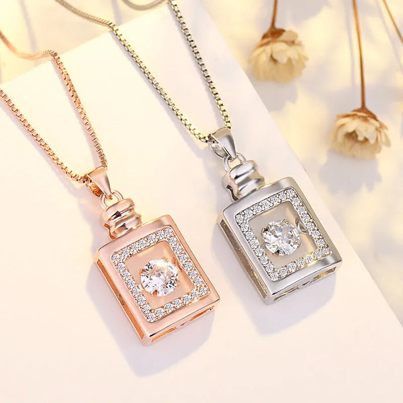 Sterling silver love heart pendant necklace with crown and bow detailing in rose gold or silver finish