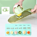 Transparent green multifunction vegetable cutter with stainless steel blade and 1.5-litre bowl