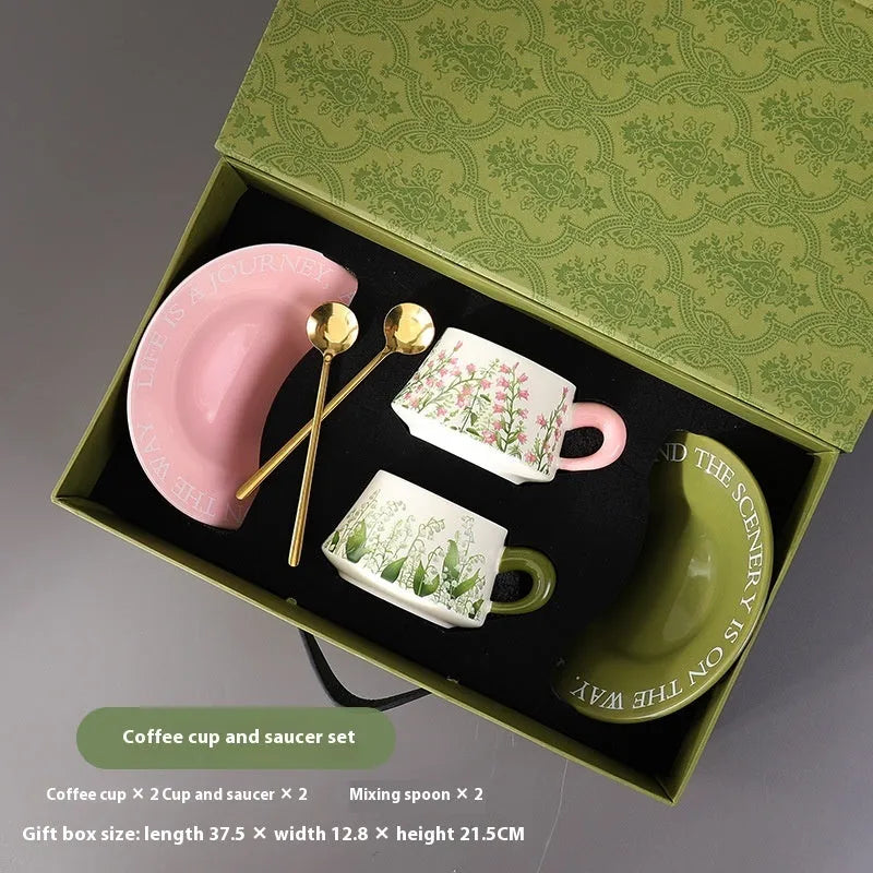 Ceramic coffee cup and saucer set with two 300ml cups, two saucers, and two spoons