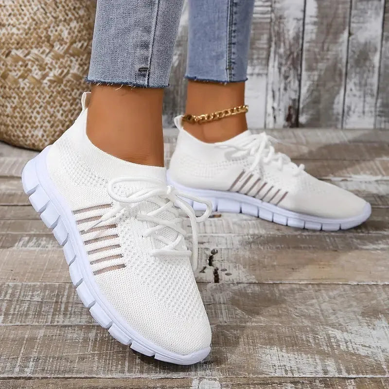 Women's breathable mesh flying knit flat shoes with round toe and low heel design