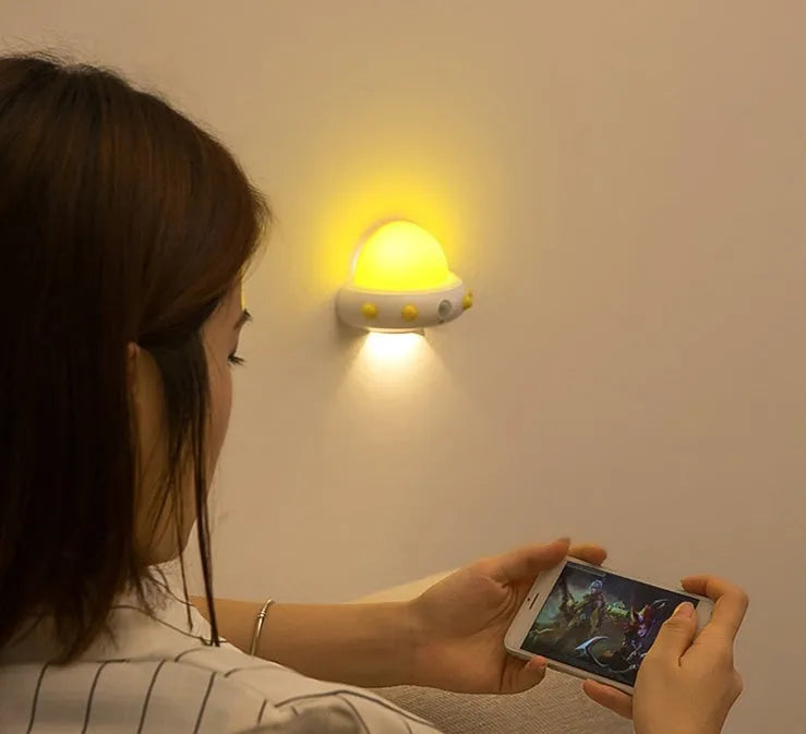 Remote control UFO shaped bedside night light in blue, pink or white colours