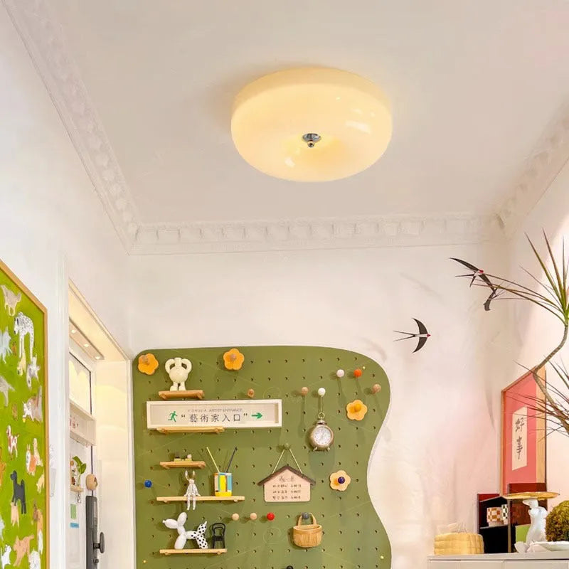 Cream coloured American style bedroom ceiling light with a three-colour lighting system.