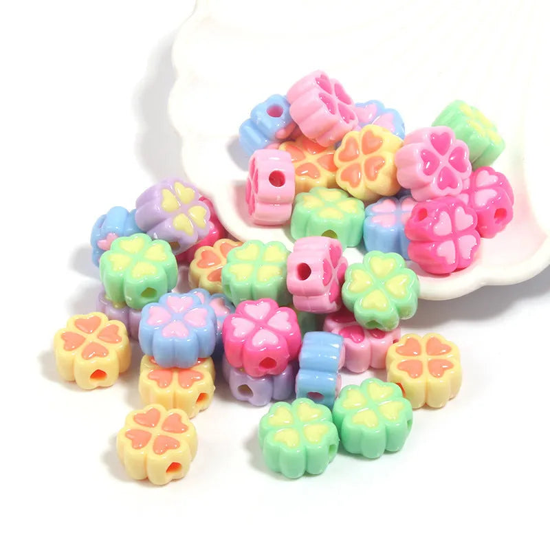 15mm acrylic craft beads with four-leaf clover shape and frosted finish in multiple colours