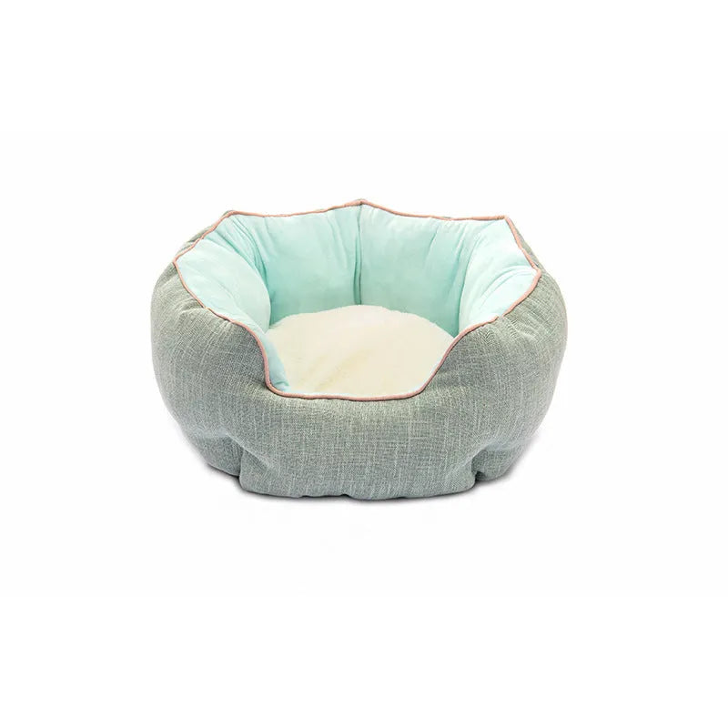 Blue octagonal pet sofa bed with a removable central mat for a small dog or cat.