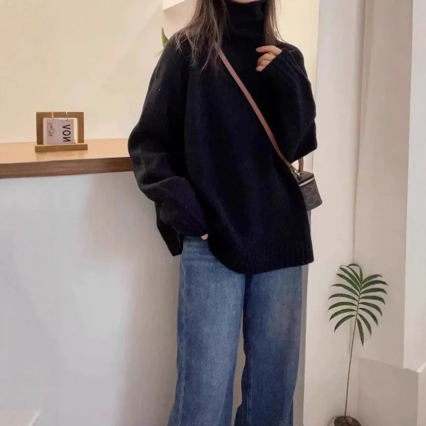 Women's loose fit turtleneck sweater in thick mesh polyester with curling pile collar
