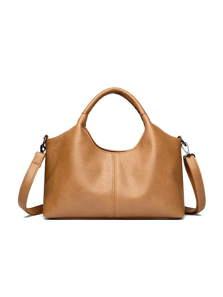 Genuine leather women's cross-body bag in available colours with adjustable shoulder strap