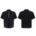 Men's black loose fit polo shirt with square collar and heavy embroidery sequin pattern on chest