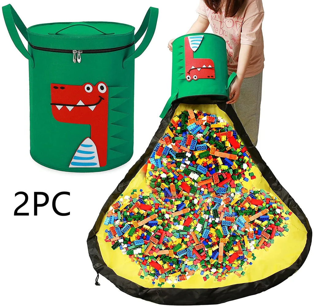 Green felt cube storage bag with a pull rope, laid flat as a play mat.