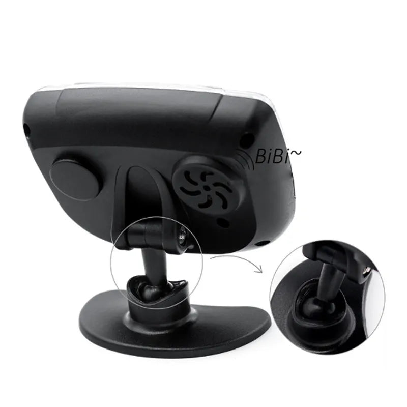 Black wireless reversing sensor kit with digital display, four round probes, power cable, and installation tools.