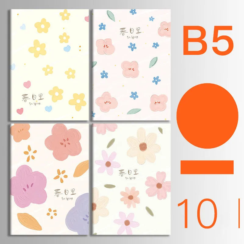 Set of 10 thread-bound softcover notebooks in various designs including kraft paper and printed patterns