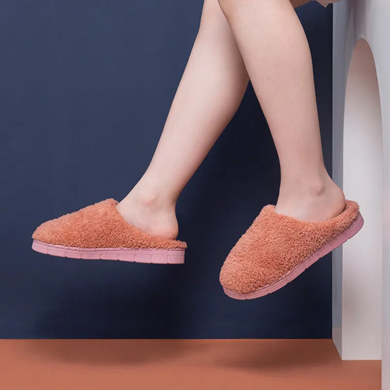 Furry suede thickened non-slip bedroom slippers in caramel colour on tiled floor