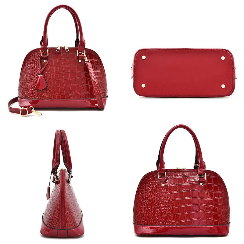 Shiny PU crossbody shoulder bag in shell shape showing black, red, and brown colour options