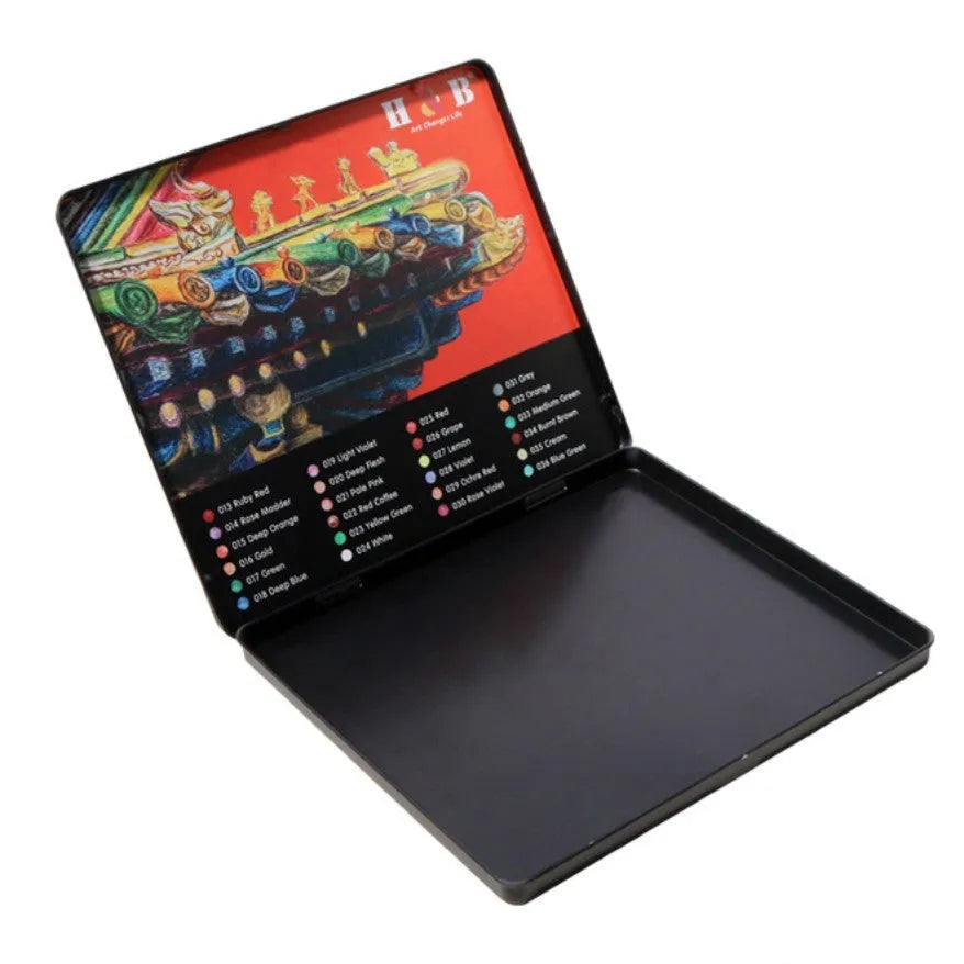 Open iron box showing 24 water-soluble coloured pencils in assorted colours.