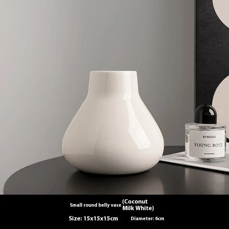 Modern black ceramic vase set with artificial white orchid flowers for home decoration