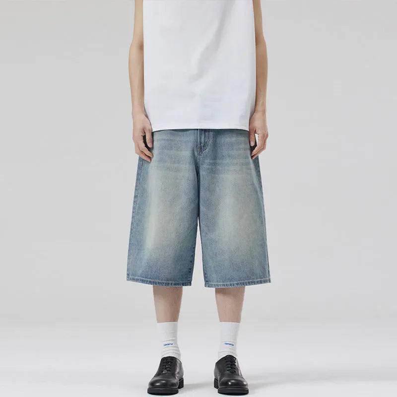 Men's light blue cotton denim loose-fit straight-leg summer shorts on a neutral background