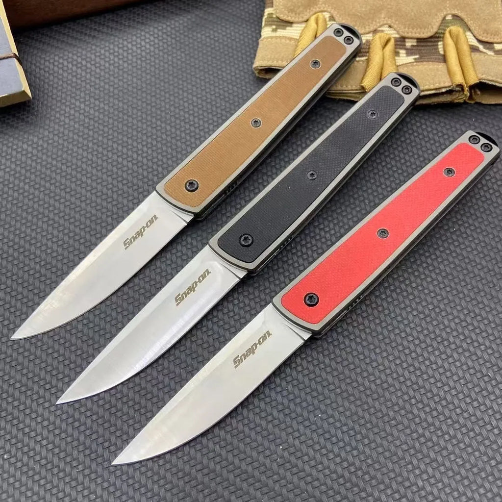Folding fruit knife with stainless steel blade extended, showing black handle variant with blade measurements