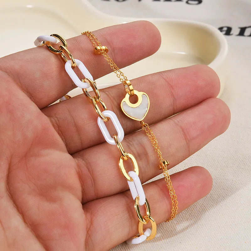 Women's stainless steel and resin double layer heart bracelet with electroplated finish