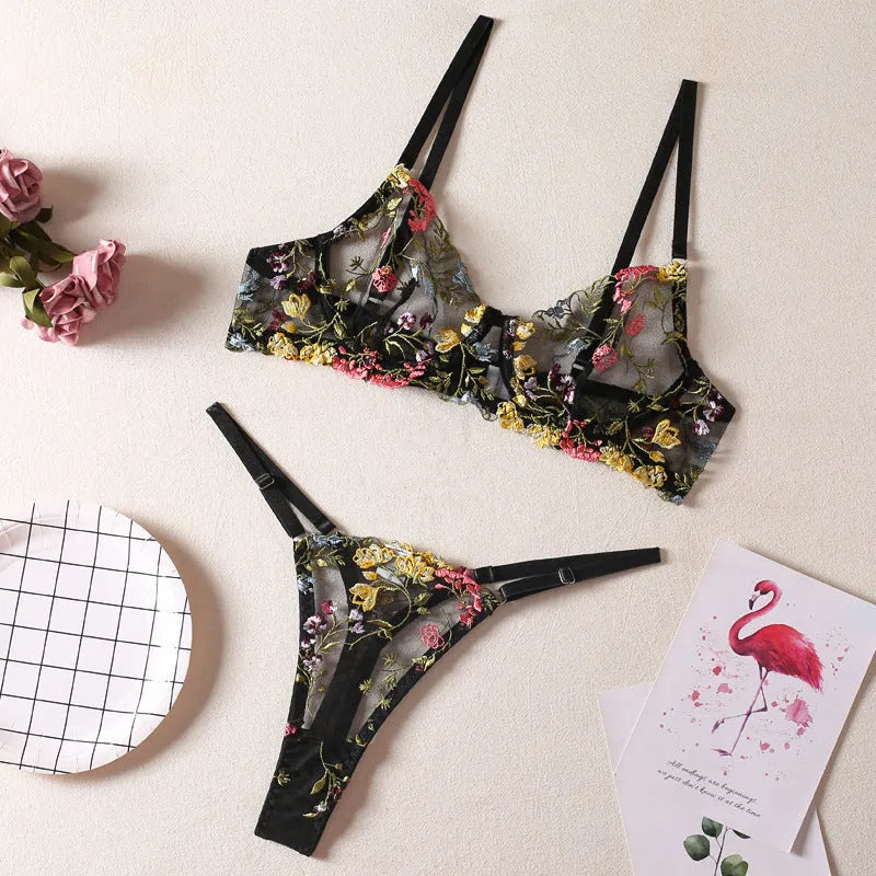 Floral patterned mesh bra with steel ring detail on T-back strap, shown in skin colour.