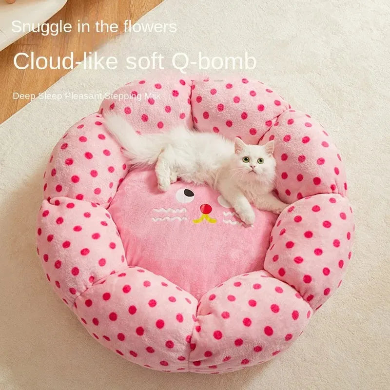 Pink dot patterned fabric cat bed shown in two sizes: 45cm and 65cm diameter.