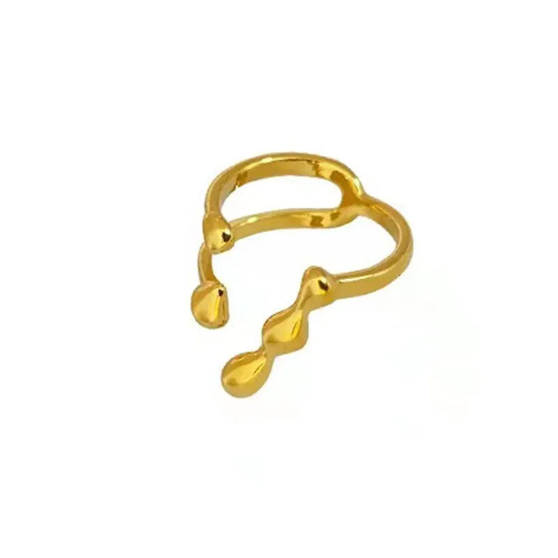 Women's brass opening ring with gold finish and circle sphere design