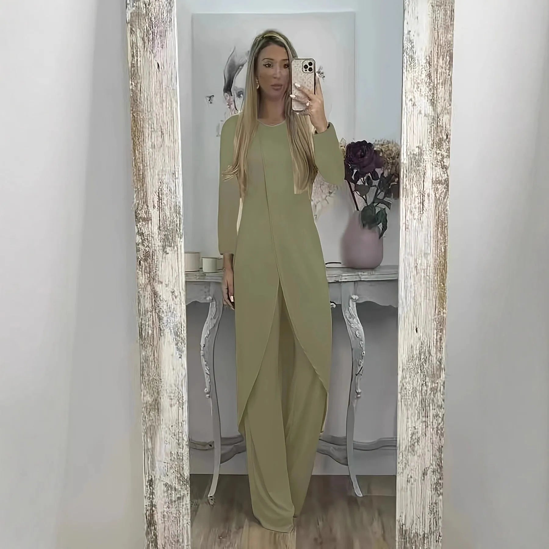 A loose-fitting long sleeve two-piece lounge set in polyester, shown in black, blue, and khaki colour options.