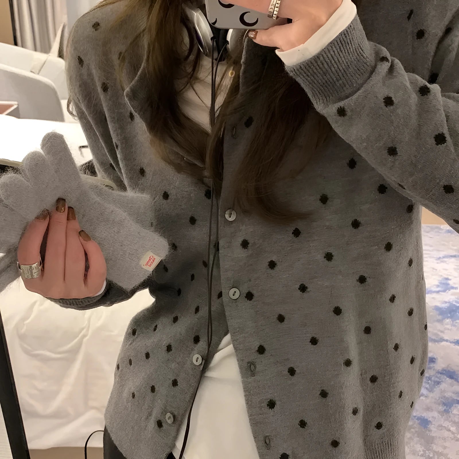 Women's Korean-inspired grey dot pattern knitted cardigan with crocheted flower details and long sleeves