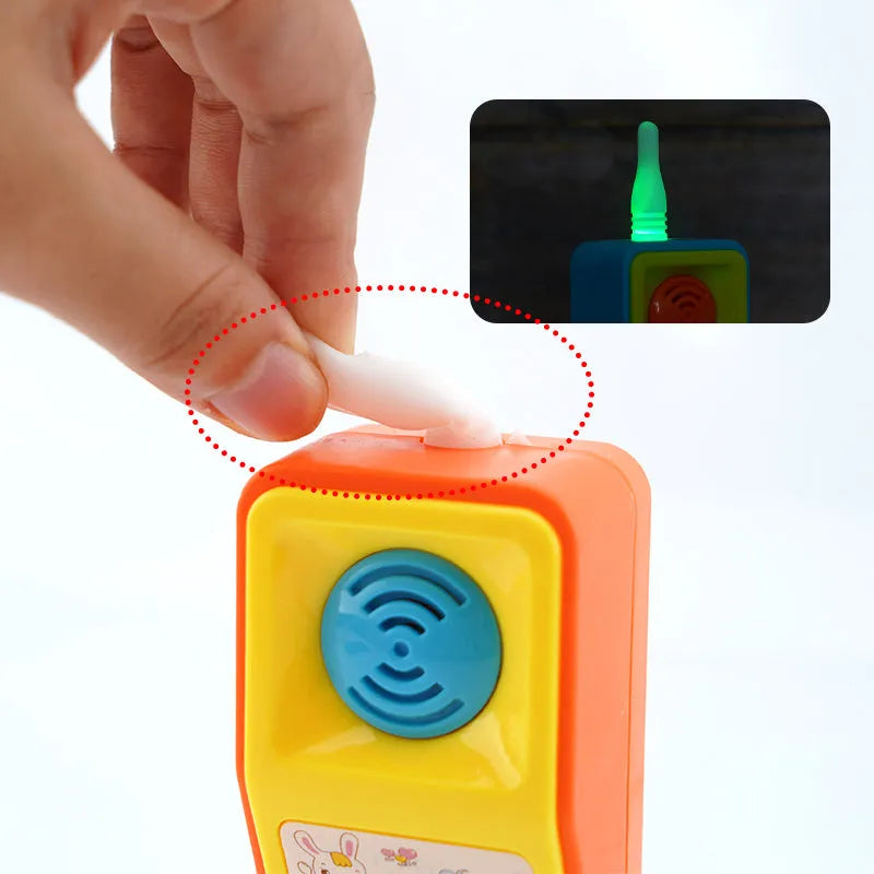Children's educational toy with sound, light and music features showing cartoon animal designs